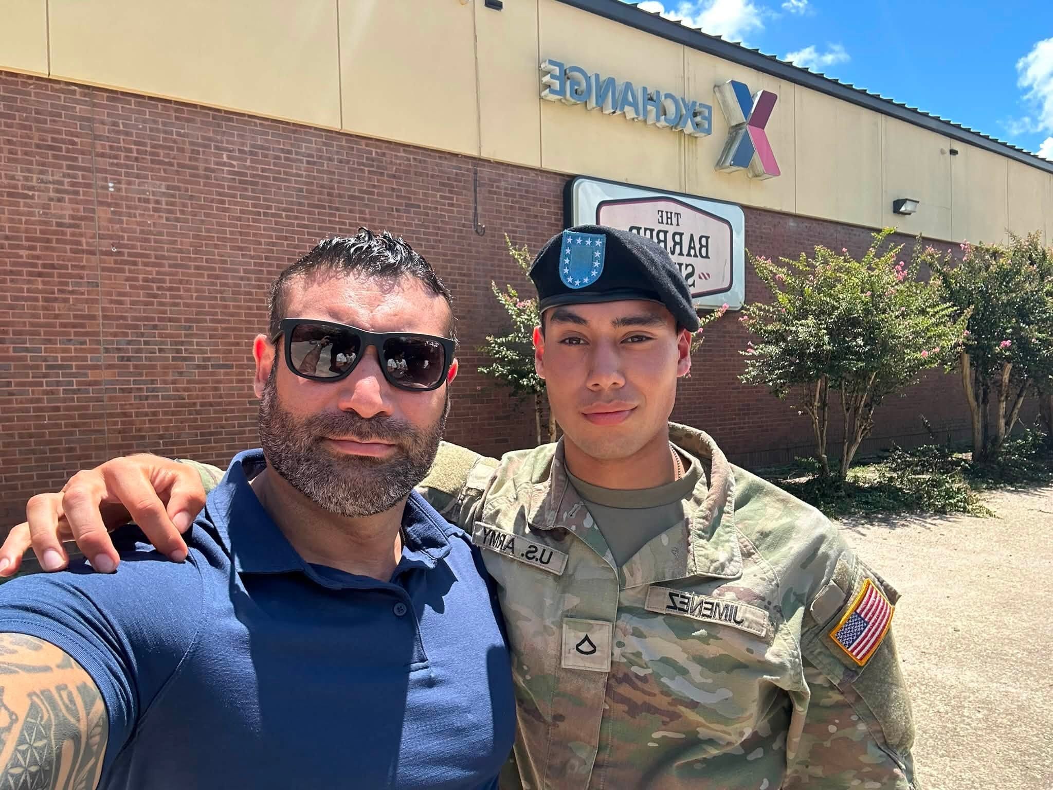 Sam with his son at the Army Exchange